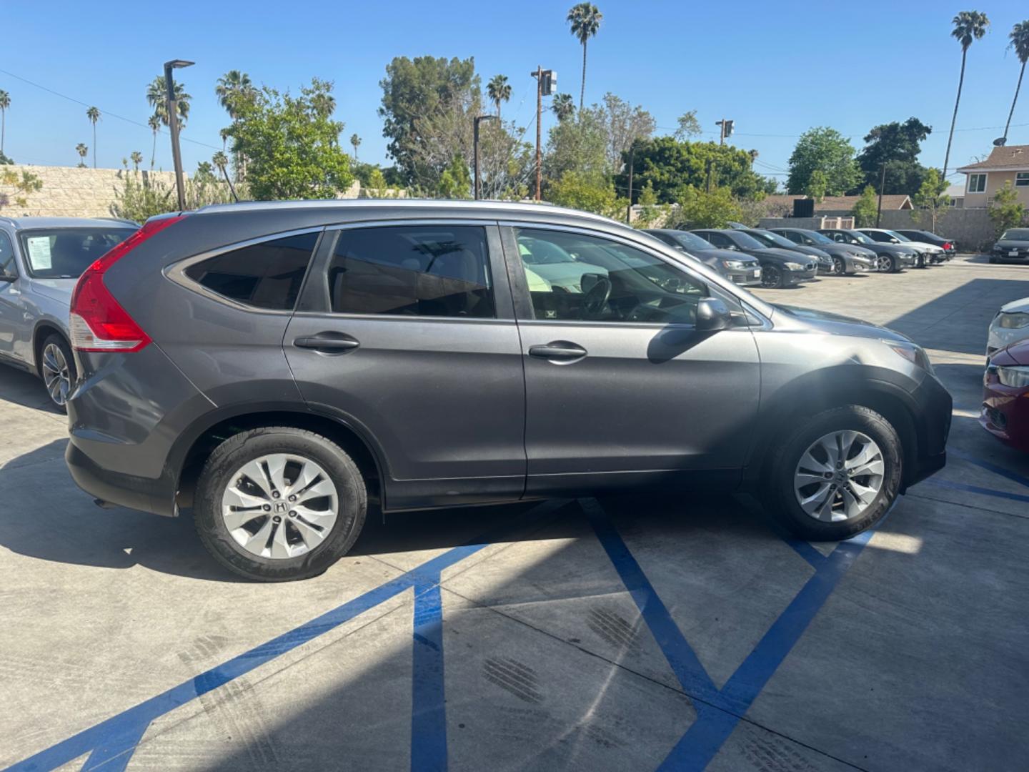 2012 BLUE /GRAY Honda CR-V leather (JHLRM3H70CC) with an 4 CYLINDER engine, Automatic transmission, located at 30 S. Berkeley Avenue, Pasadena, CA, 91107, (626) 248-7567, 34.145447, -118.109398 - Cars and Trucks!! Leather! Moon-roof! Well equipped! In the bustling streets of Pasadena, CA, and the vibrant neighborhoods of Altadena, Glendale, and the broader LA County, finding a reliable, stylish, and affordable vehicle can be a daunting task, especially if you're navigating the complexities - Photo#6